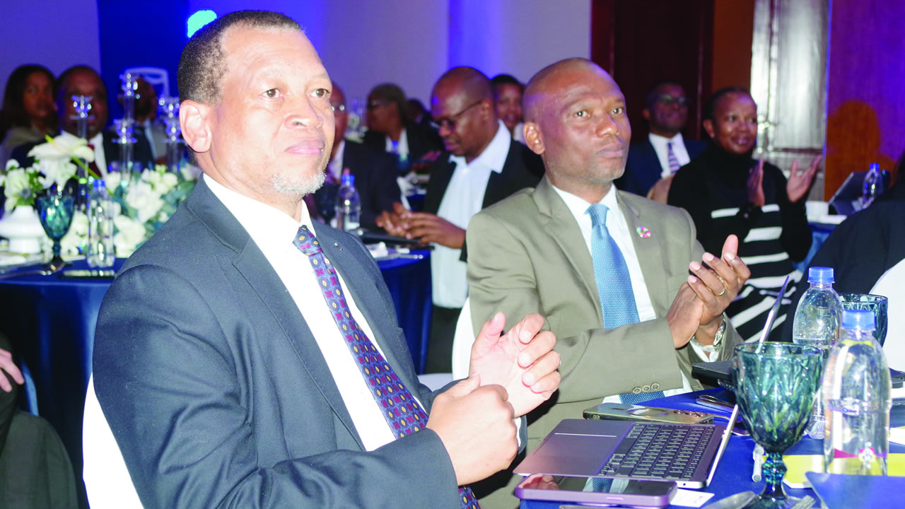 Standard Bank Eswatini Chief Executive Mvuselelo Fakudze and Business Eswatini CEO Nathi Dlamini