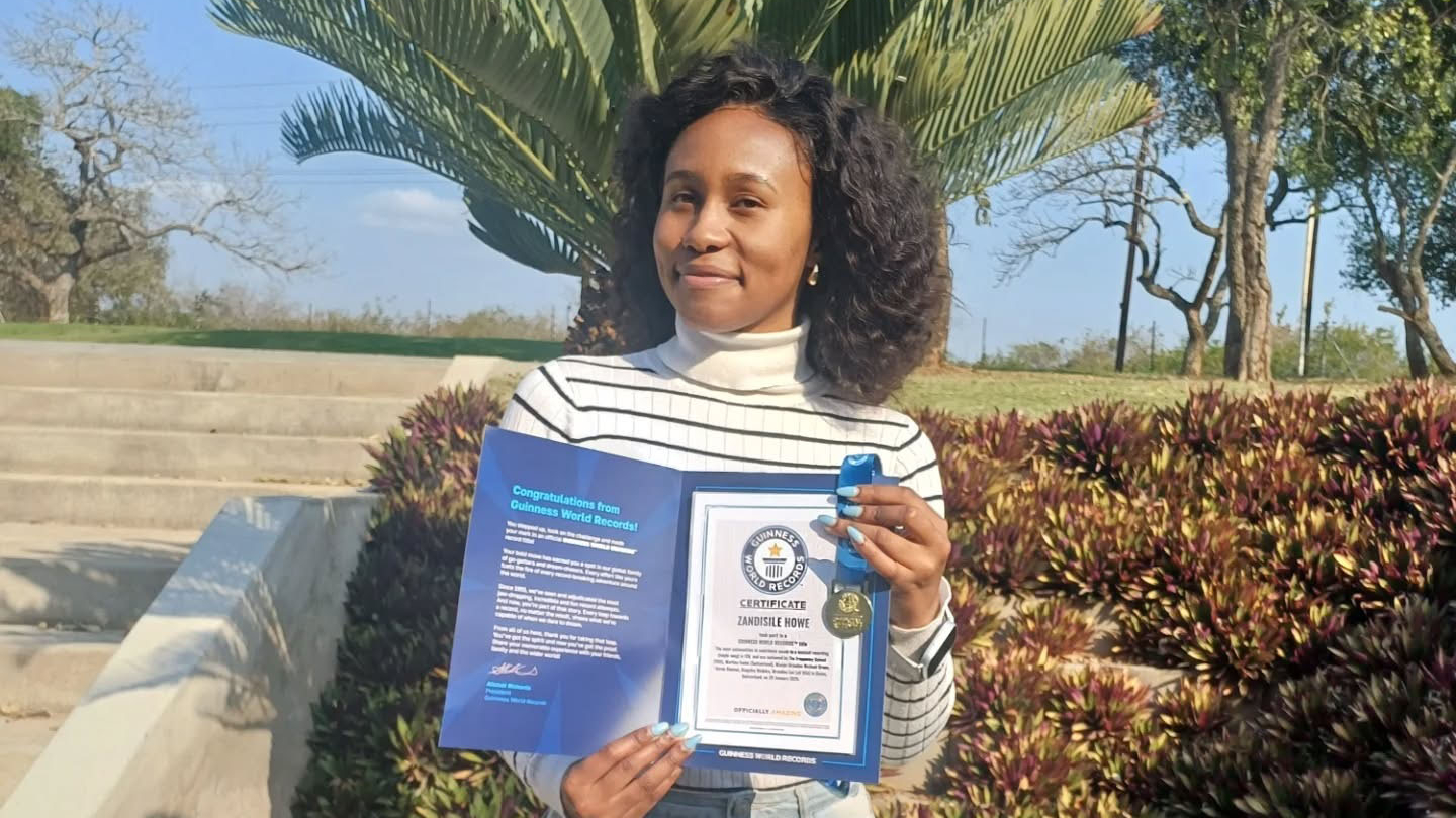 Howe with her Guinness World Records certificate.