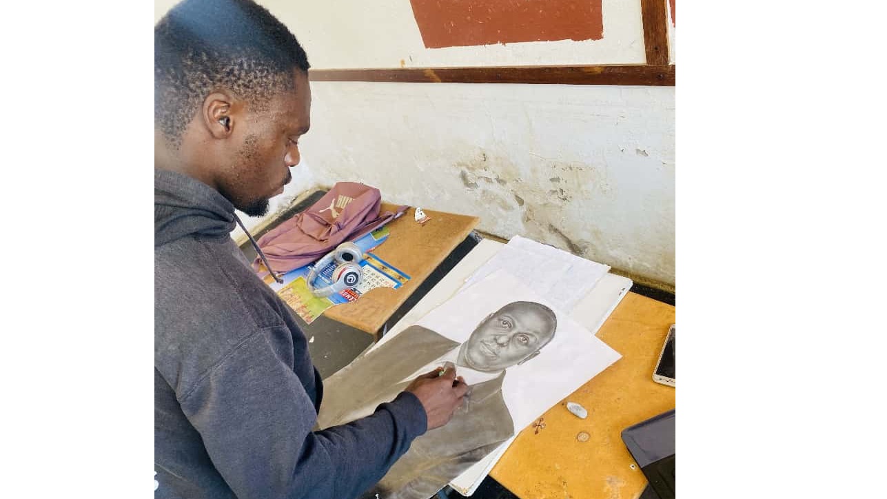 Thabo Shongwe finishing up a portrait of Prime Minister Russell Dlamini.