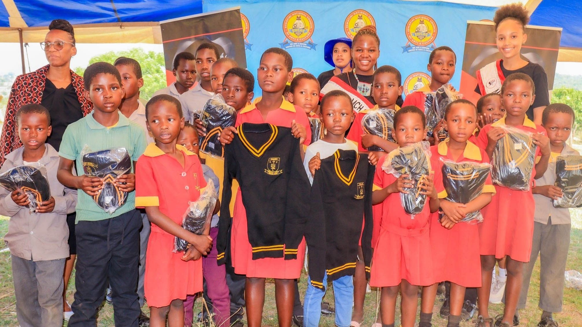 Miss Cultural Heritage brought smiles to the pupils of Nyakatfo Primary School and donated jerseys.