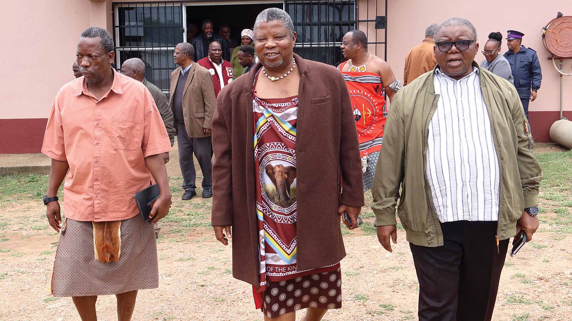 Indvuna Themba Ginindza (C) flanked by (L-R) Ludzidzini Council Secretary Prince Nhlonipho and Lubombo RA Themba Msibi as he walked out of the Siphofaneni Inkhundla Centre, where he delivered the ruling on the Madlenya/KaMkhweli chieftaincy dispute yesterday.