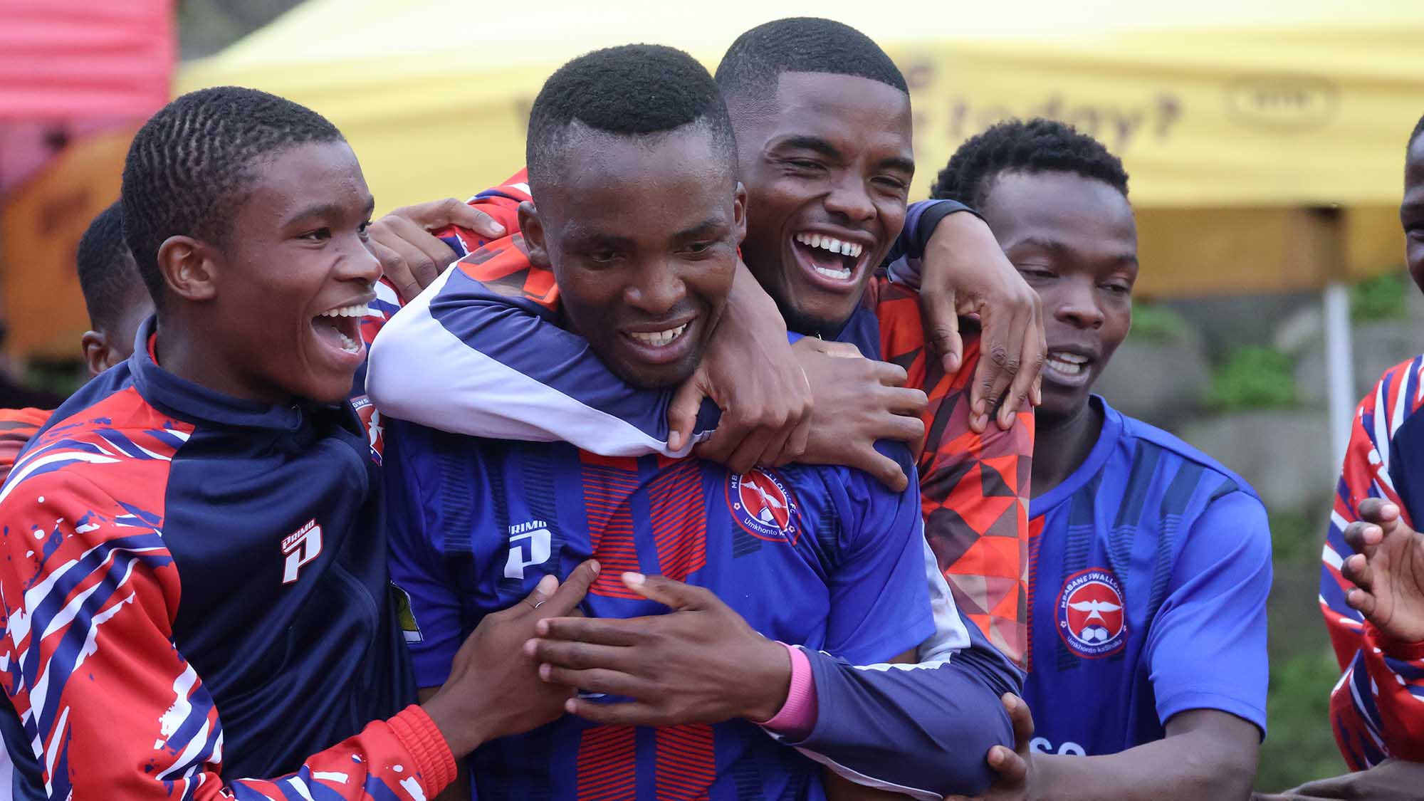 Mbabane Swallows celebrate their second goal in the 2-0 win over Manzini Wanderers in yesterday's 'Super Sunday' clash at Mavuso Sports Centre. (Pics: Melusi Mkhabela)