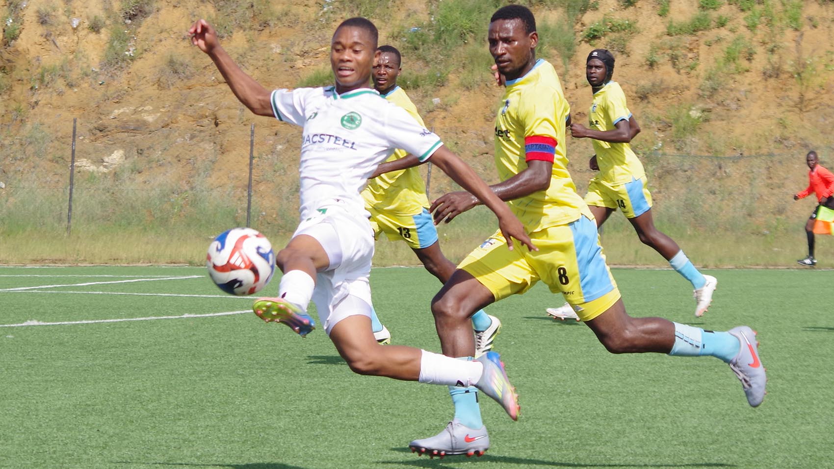 Nsingizini Hotspurs’ Quality Dlamini controls the ball under pressure from Sisonkhe captain Msimisi Dlamini during their MTN Premier League clash at Kalanga Technical Centre, which Hotspurs won 1-0. (Pics: Sanele Jele)