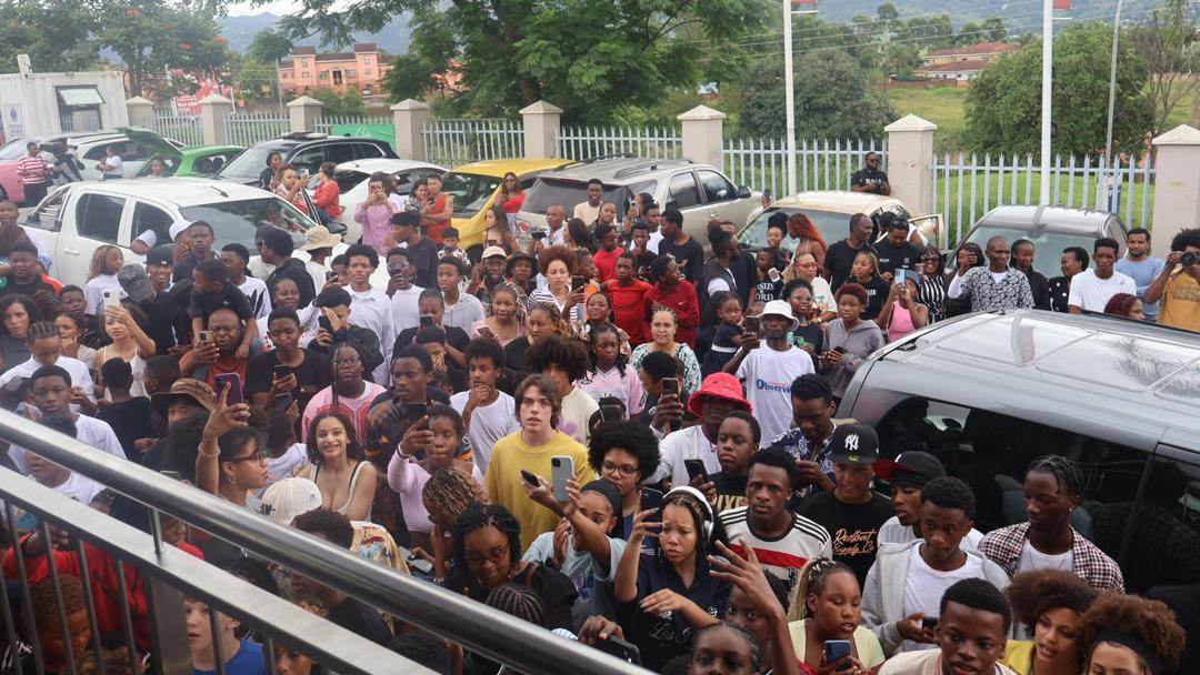The crowd of fans waiting outside of KFC in Gables as the US streamer was making his order inside the establishments.