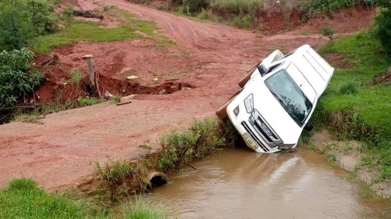 This vehicle slipped into the river while negotiating the gently corner at the bridge. (Courtesy pic)