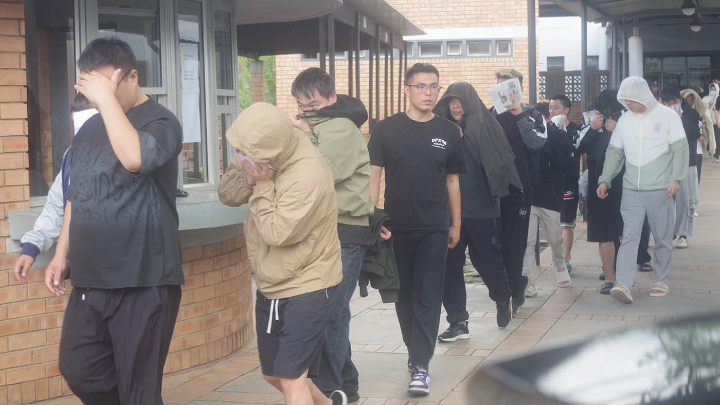 The foreign nationals leaving the Mbabane Magistrates Court after their first court appearence.