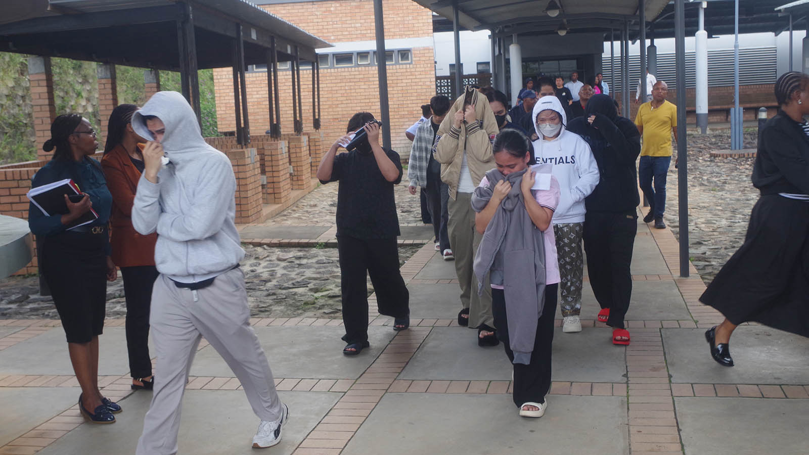 Hiding of faces was the order of the day as more foreign nationals appear in court for entering, remaining and engaging in employment in the country without valid permits.