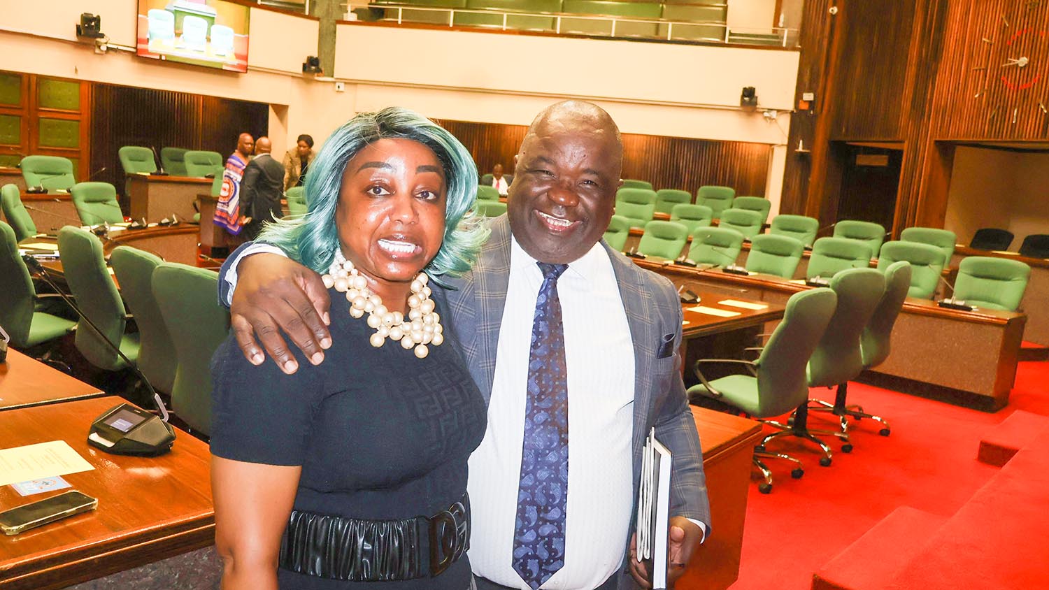 Minister for Information, Communication and Technology Savannah Maziya with Minister for Education and Training Owen Nxumalo having a light moment.