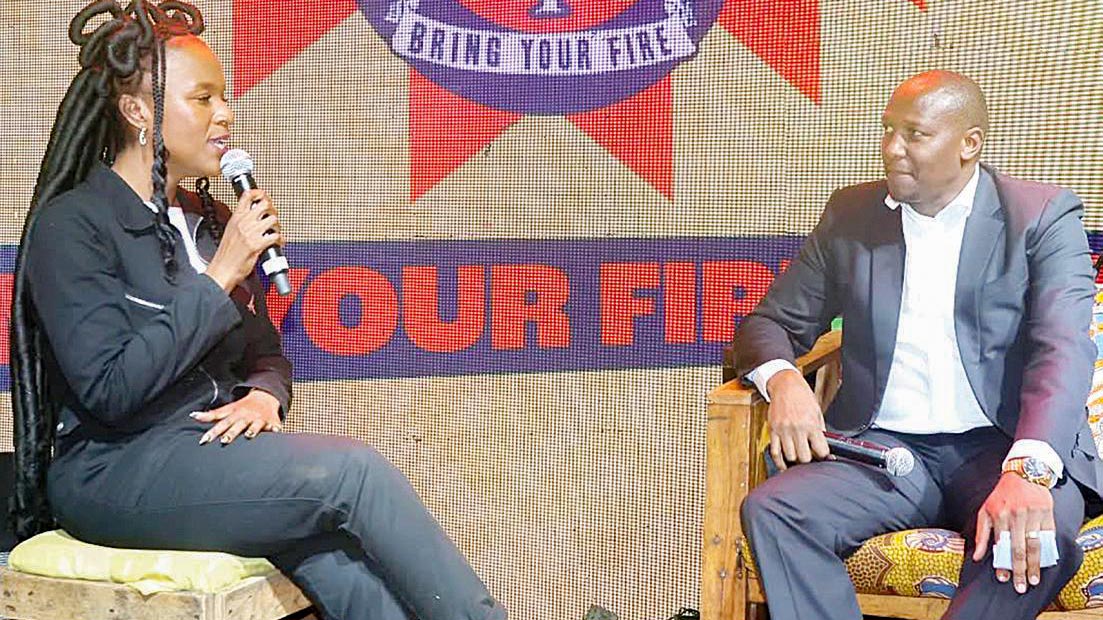Prime Minister Russell Mmiso Dlamini having a conversation with MTN Bushfire’s Phiwo Dhlamini at the MTN Bushfire Broadcast Corner yesterday, where he challenged the MTN Bushfire Festival to double its economic contribution to Eswatini.