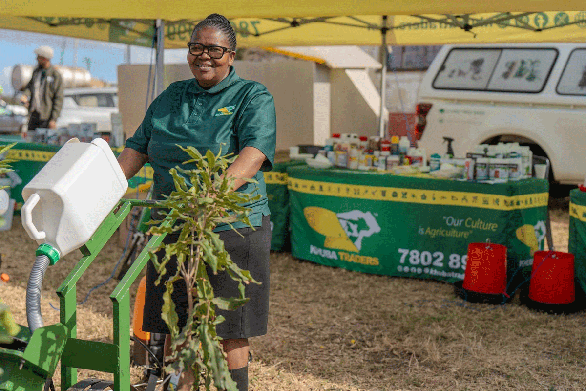 Shiselweni Sales Representative at Khuba Traders Deli Mamba with one of their products they had brought to showcase to farmers.
