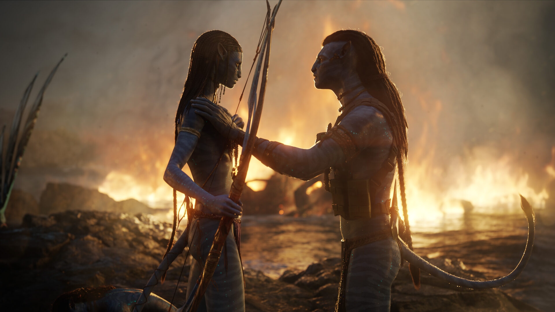 From left, Neytiri (Zoe Saldana) and Jake Sully (Sam Worthington) in u2018Avatar: The Way of Water.u2019