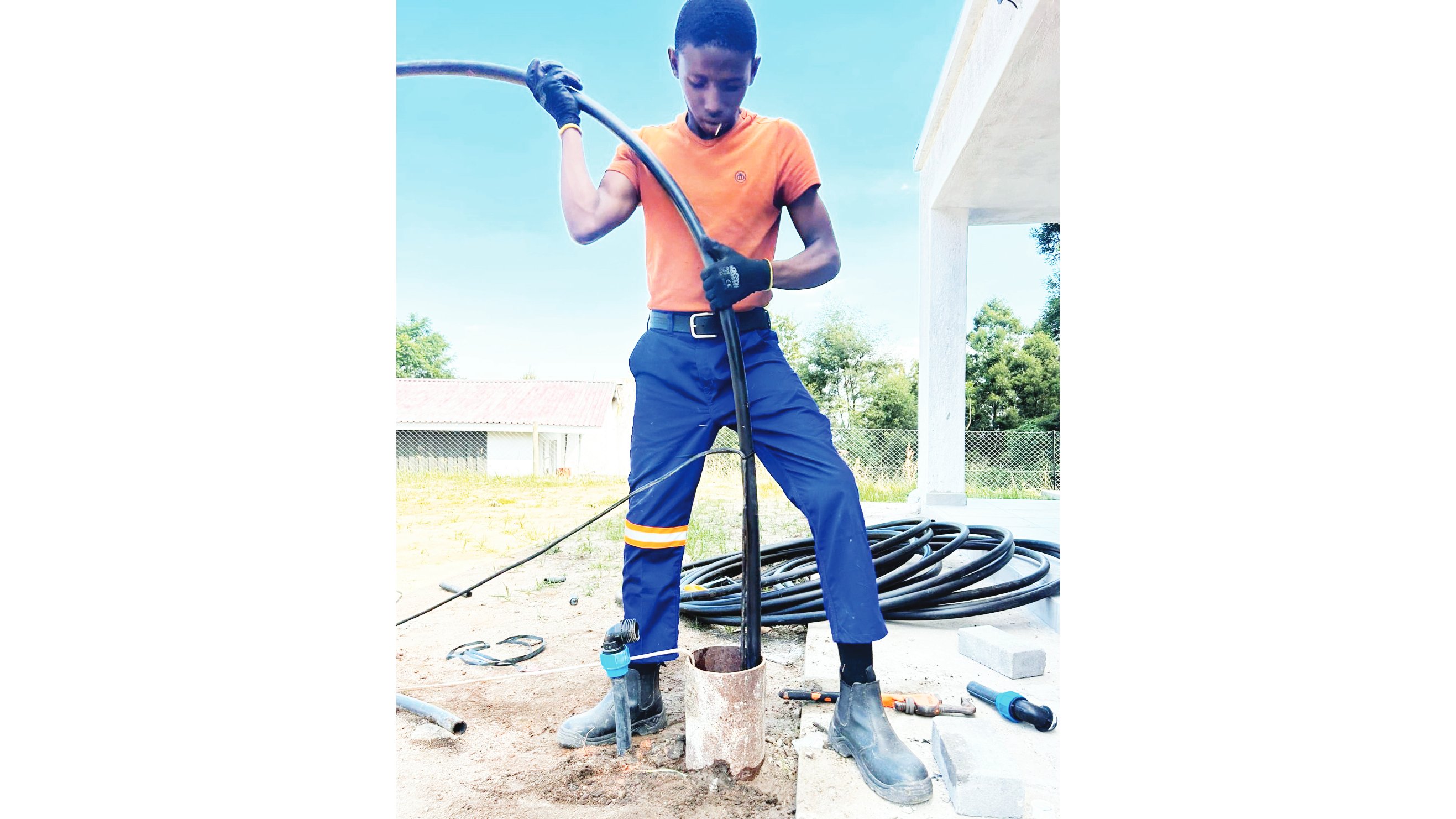 One member of the Mvura team during one of their pump installations.