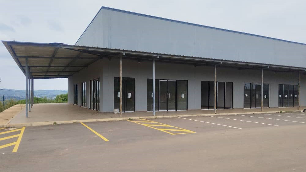 This complex offers approximately 20 commercial spaces, all featuring high ceilings