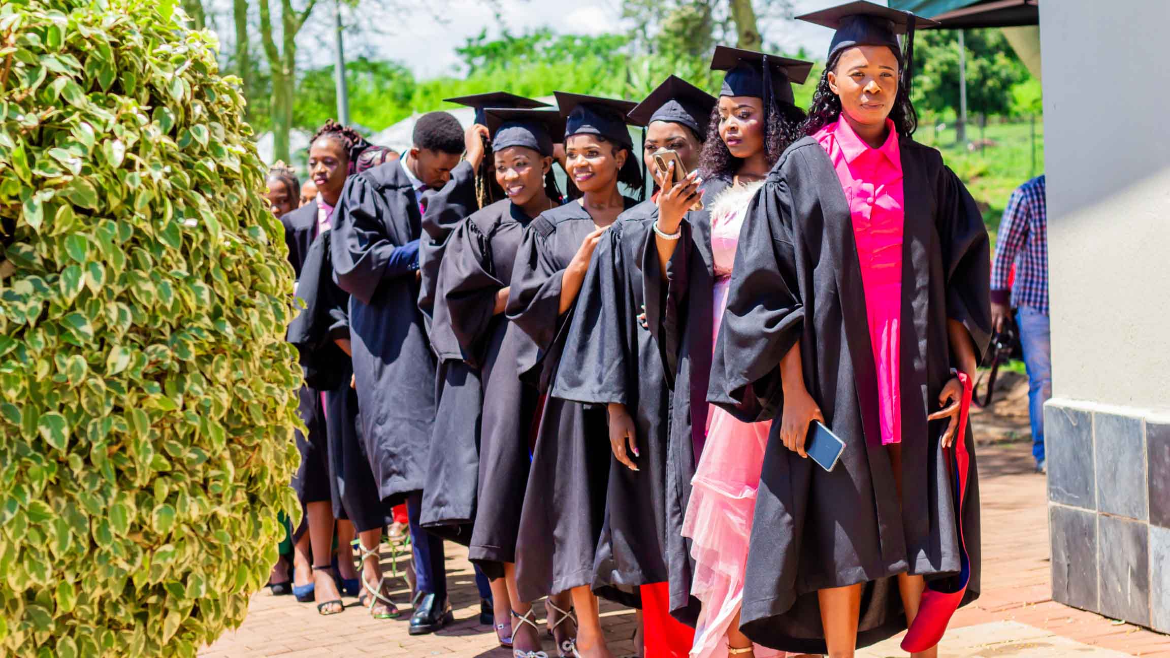 Graduands from Litfuba Campus Art and Skills College line up in their gowns, ready to celebrate the completion of their courses and acquire industry-relevant skills. (Courtesy pics)