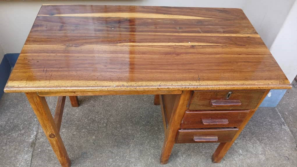 This wooden desk with drawers is also set to go under the hammer.