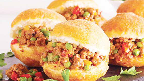 Chilli mince with vetkoek.