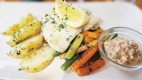 Perfectly flaky, beautifully seasoned, and finished with a fresh squeeze of lemon.