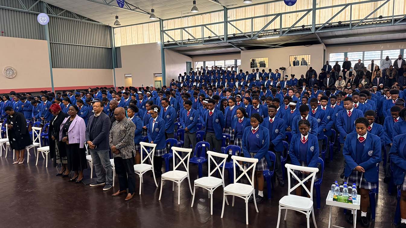 Students and guests gather inside the Sifundzani High School auditorium for the high-powered scientific symposium.