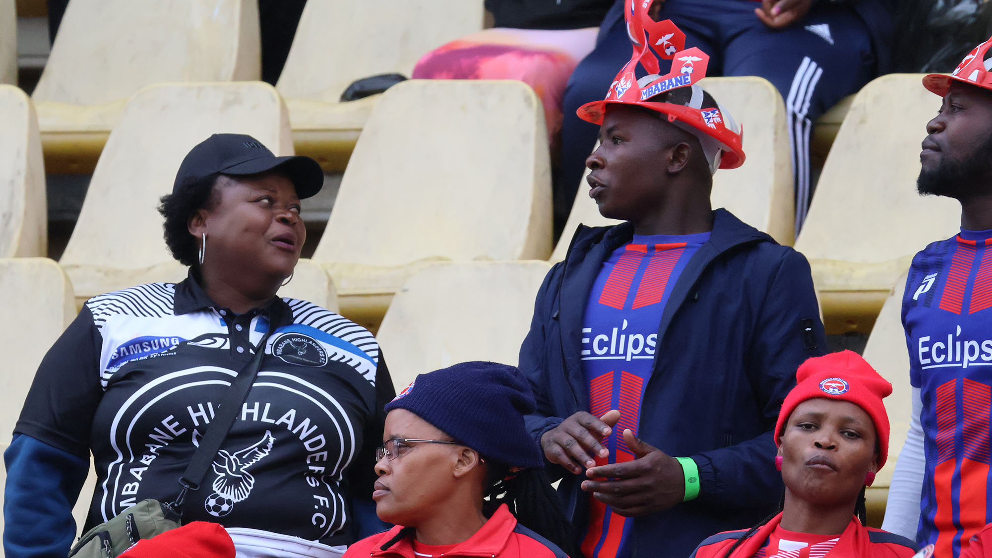 UNITY IS STRENGTH: Despite being arch-rivals, this Mbabane Highlanders supporter stood in song with Mbabane Swallows supporters during their 3-2 victory over Royal Leopard.