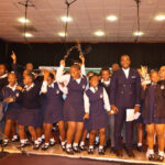 Edwaleni High School celebrating with their conductor after being crowned Champ of Champs 2026 during the competition. (Pic:Takhona Sithole)
