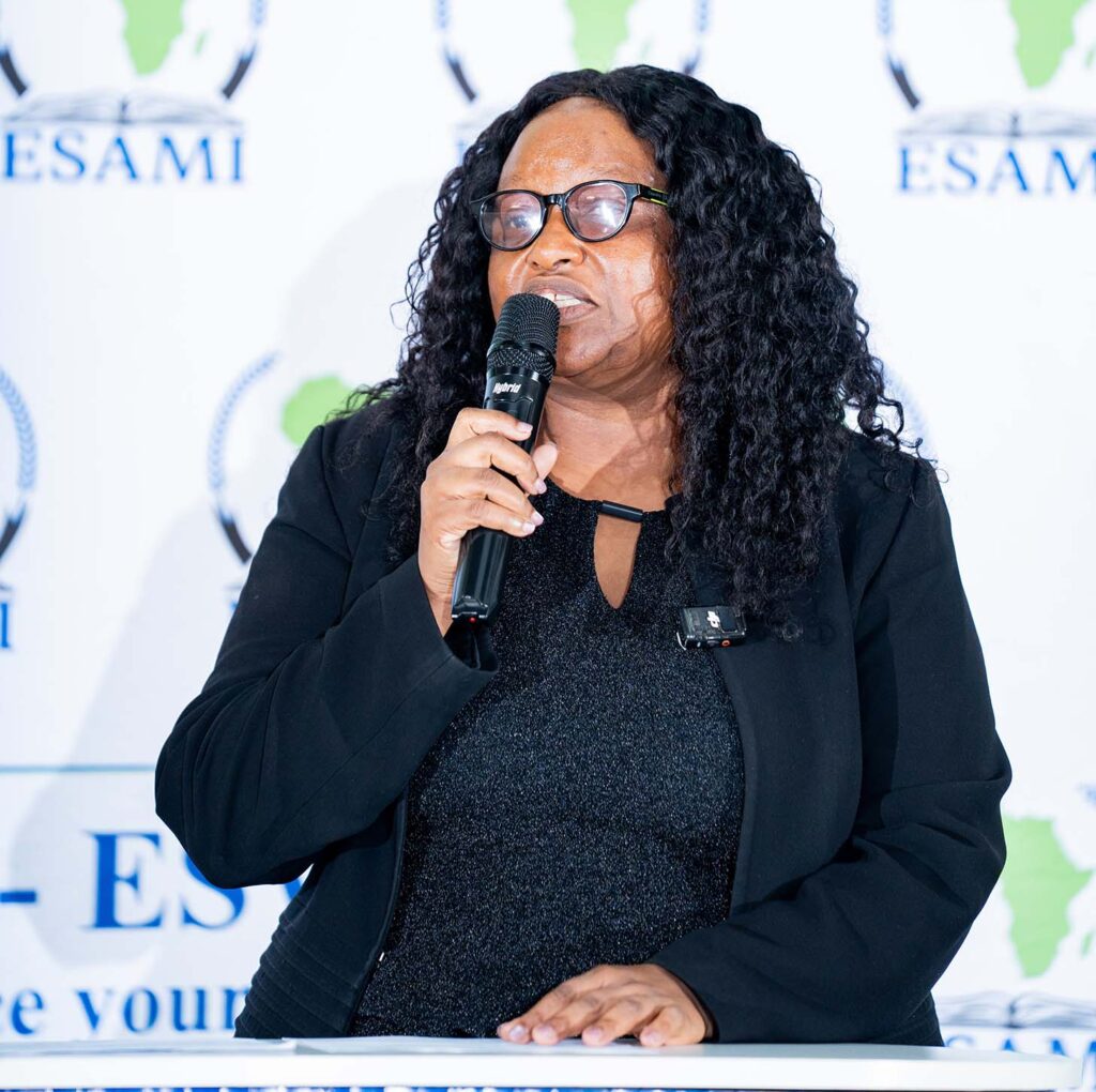 ESAMI Country Manager Winile Nxumalo welcomes alumni and guests to the 50th-anniversary celebration at Happy Valley.