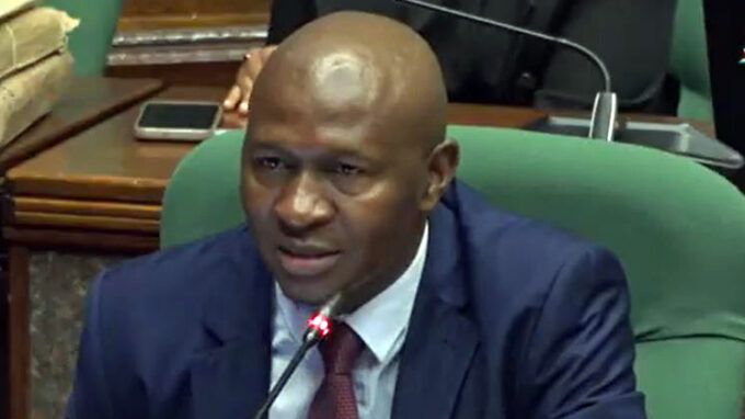 Funduzi Forensic Services Director Zakhele Dlamini presenting a preamble of the report into the recall of medical drugs.
