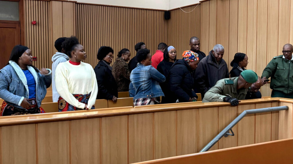 Accused Deputy Sheriff, Vusi Mncina, faces down as his relatives and those of the shot women leave the High Court after he had given his testimony yesterday. Mncina apologised to relatives and friends of the victims. (Pic: Kwanele Dlamini)