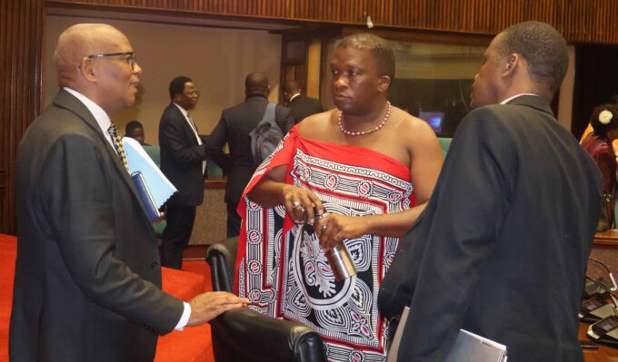 Ministry of Health Principal Secretary, Khanya Mabuza (L) iin a conversation with Public Accounts Committee (PAC) Chairman and Mhlangatane MP Madala Mhlanga (C) while PAC Clerk at Table Arthur Mordaunt looks on. (Pic: Sabelo Majola)