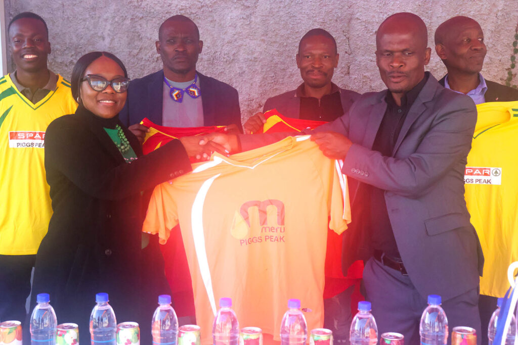 Meru Filling Station Manager Precious Dlamini presenting ERA Chairman Mbongiseni Fakudze with the Meru branded kit for the regional referees games.