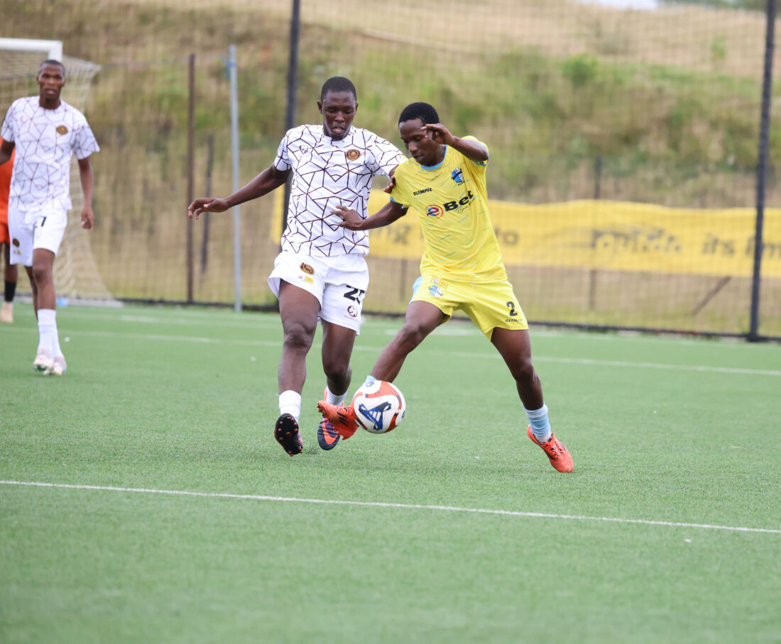 Manzini Wanderers’ Mpendo Maseko (L) closes in on Sisonkhe Mukelo Nhlabatsi during their MTN Premier League match last season. (File pic)