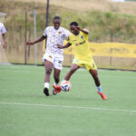 Manzini Wanderers’ Mpendo Maseko (L) closes in on Sisonkhe Mukelo Nhlabatsi during their MTN Premier League match last season. (File pic)
