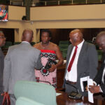 Minister for Agriculture Mandla Tshawuka with PS Sydney Simelane engaging with some of the MPs after the ministry’s debate. (Pic: Mnelisi Dlamini)