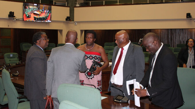 Minister for Agriculture Mandla Tshawuka with PS Sydney Simelane engaging with some of the MPs after the ministry’s debate. (Pic: Mnelisi Dlamini)