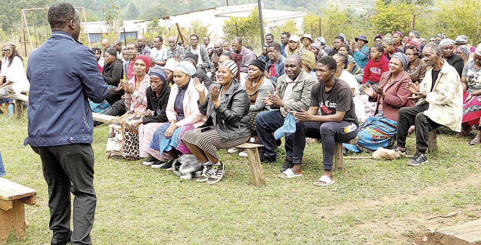 Nyonyane residents reacting by a clap of hands as their MP Michael Masilela promises to be their voice on the compulsory DNA, medical aid and elderly grant increase.