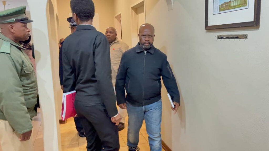 The accused, Vusi Mncina, in the house where the five women were shot at Goje Township in Ezulwini on October 28, 2023. (File pic)