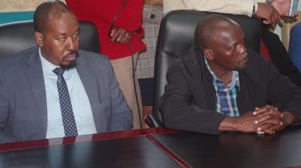Chairperson of the Manufacturing and Sale of Handcraft Indursty Wages Council Ben Simelane (R) and Nsindiso Tfwala, Chairperson of Manufacturing and Processing Industry Wages Council listening attentively at the press conference.