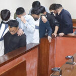 Chinese nationals leave the Manzini Magistrates Court yesterday after their appearance. Their matter was postponed to tomorrow, when both parties are expected to present the required documents. (Pic: Siphosethu Dlamini)