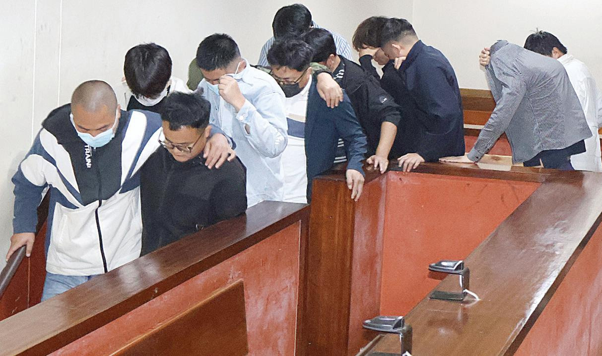 Chinese nationals leave the Manzini Magistrates Court yesterday after their appearance. Their matter was postponed to tomorrow, when both parties are expected to present the required documents. (Pic: Siphosethu Dlamini)