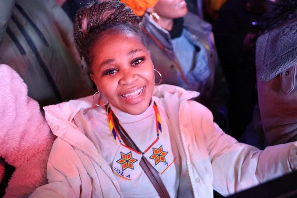 Senamile Dlamini donning the beaded necklace she received from Zola. Dlamini who attended the festival with her sister could not contain her excitement after receiving the gift. (Pics: Mlondzi Nkambule)