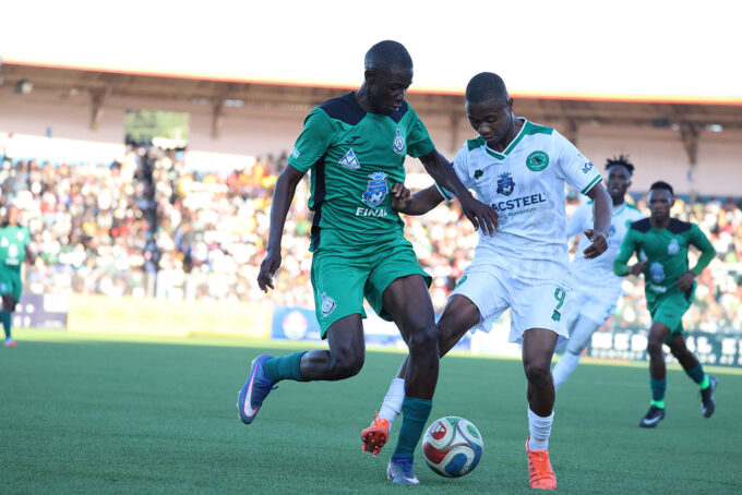 Green Mamba's Njabulo 'Magwegwe' Magagula in a fierce battle for the ball against Quality 'Mashimeni' Dlamini. The two sides now know their 2026/27 TotalEnergies CAF interclub competitions opponents. (Pic:Nimrod Hlophe)