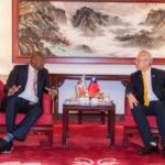 Prime Minister Russell Mmiso Dlamini having a conversation with Taiwan's Deputy Minister for Foreign Affairs, François Chih-chung Wu upon arriva at the Taiwan Taoyuan International Airport in Taipei.