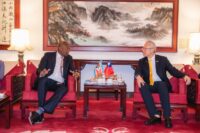 Prime Minister Russell Mmiso Dlamini having a conversation with Taiwan's Deputy Minister for Foreign Affairs, François Chih-chung Wu upon arriva at the Taiwan Taoyuan International Airport in Taipei.