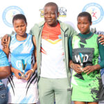 Minister for Sports, Culture and Youth Affairs Bongani Nzima flanked by standout individual performers of 2026 Tinkhundla Talent Search Netball Competition, a grassroots initiative he credited with also helping drive the ministry to top-performing status. (Pic: Nimrod Hlophe)