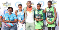 Minister for Sports, Culture and Youth Affairs Bongani Nzima flanked by standout individual performers of 2026 Tinkhundla Talent Search Netball Competition, a grassroots initiative he credited with also helping drive the ministry to top-performing status. (Pic: Nimrod Hlophe)