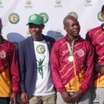 Eswatini Housing and Urban Development Minister Appolo Maphalala awarded medals to the UEDF Nhlangano Half Marathon's 5km podium male stars Wonderboy Mdluli, Nhlanhla Maphalala and Samkeliso Simelane. (Pic: Nimrod Hlophe)