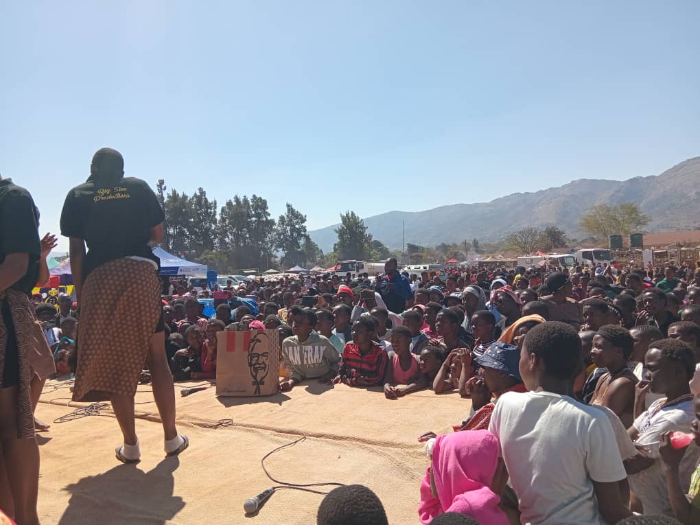 Maidens listen to teachings in form of plays and talks.