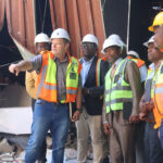 J&E Contractor General Manager Carl Smith showing the Minister for Housing and Urban Development Appolo Maphalala the damage. (Pics: Timothy Simelane)