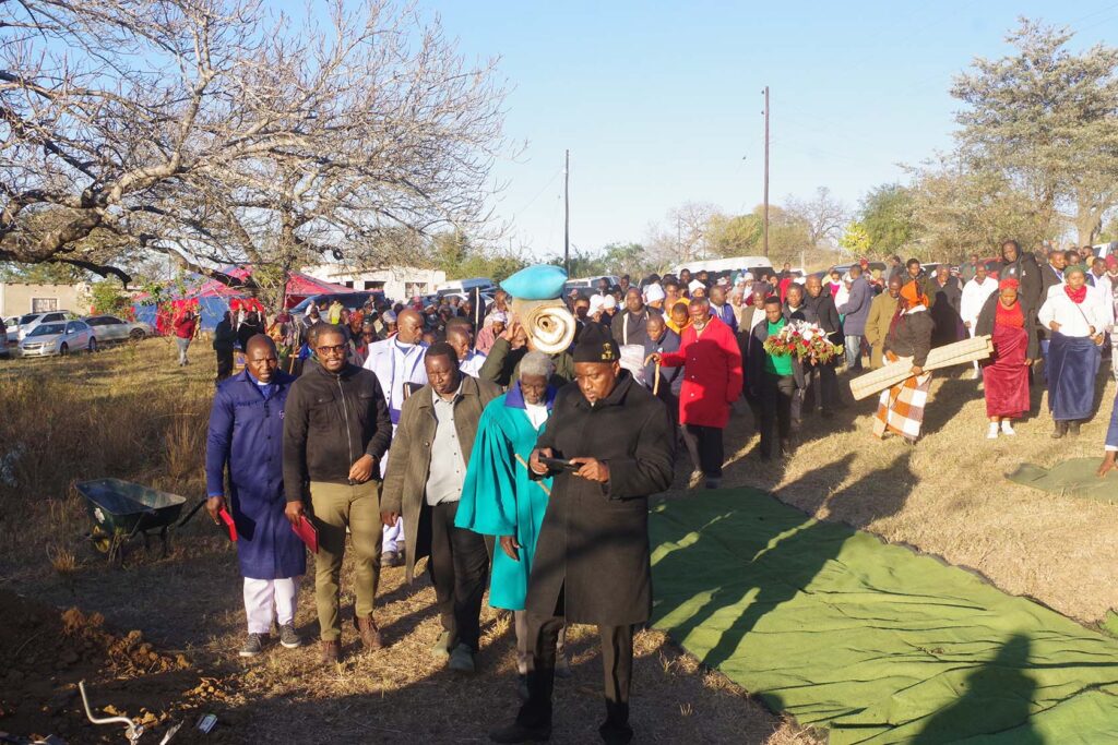 Mourners on their way to the grave yard.