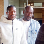 Joseph Tshimologo and Boipuso Jabulani Keagile leaving the Mbabane Magistrates Court.
