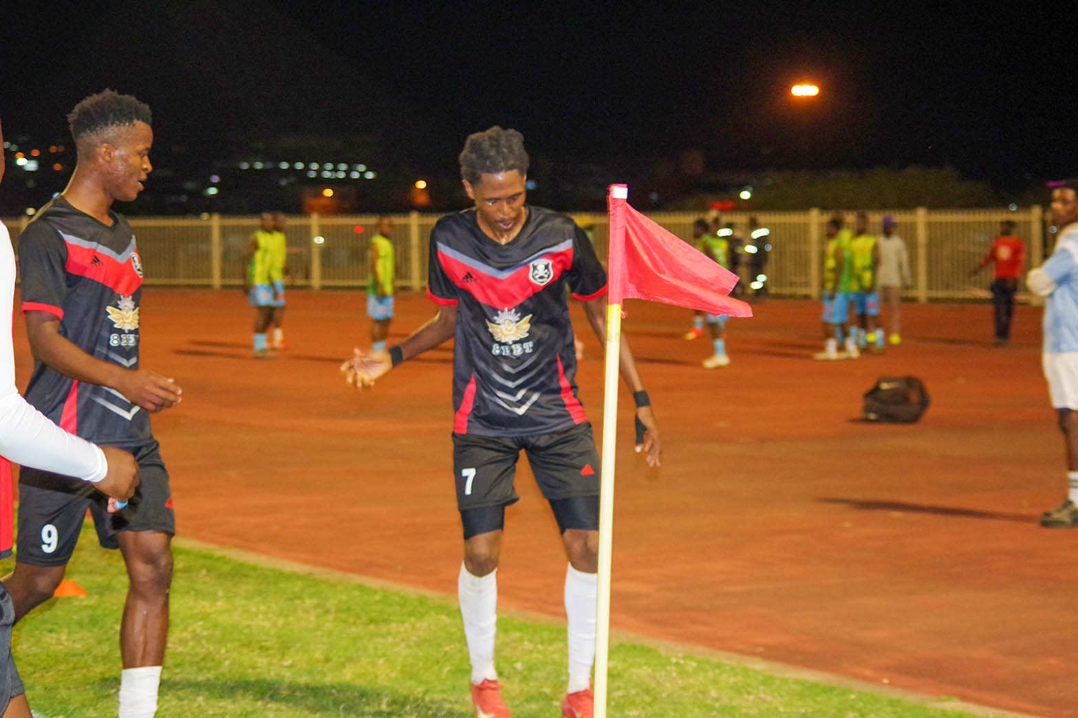 Moneni Pirates' Senanelo 'Juju' Nkambule (L) joins Biko Sibandze in celebration after his second goal that also sealed their victory. (Pic: Nimrod Hlophe)